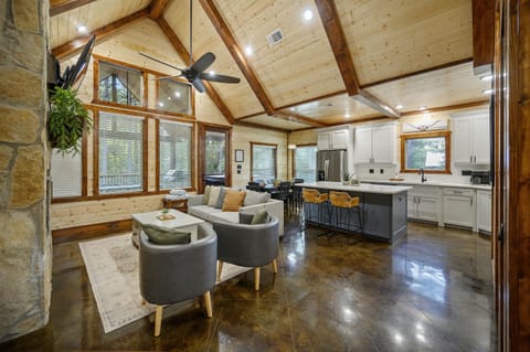 Cozing living room and fully stocked kitchen.