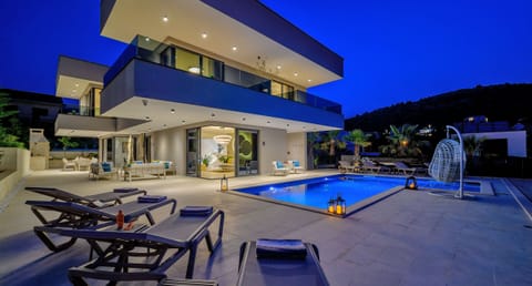 Night view at the villa and pool side.