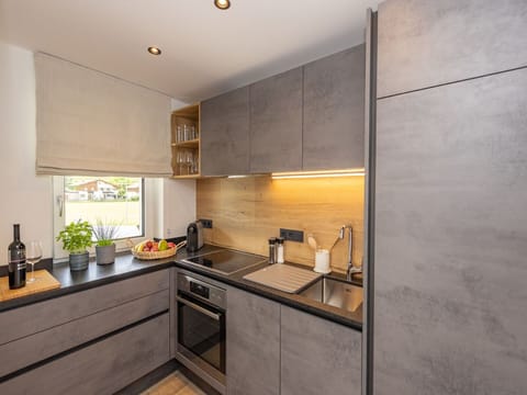 Cabinetry, Countertop, Tap, Property, Building, Kitchen Sink, Sink, Houseplant, Kitchen Stove, Kitchen