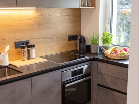 Countertop, Cabinetry, Kitchen Sink, Sink, Plant, Kitchen, Tap, Kitchen Stove, Wood, Kitchen Appliance