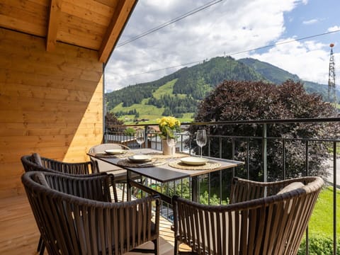 Sky, Cloud, Property, Plant, Daytime, Furniture, Building, Table, Wood, Flowerpot