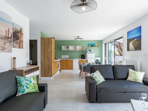 Furniture, Property, Couch, Green, Picture Frame, Blue, Comfort, Lighting, Interior Design, Floor