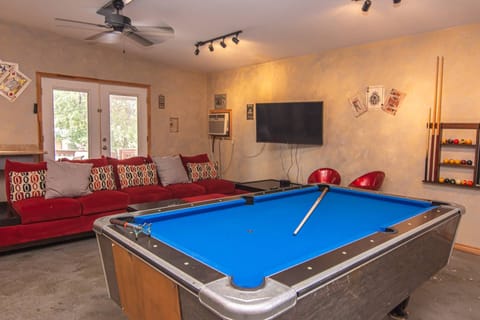 Game Room with Pool Table, TV, and Sitting Area