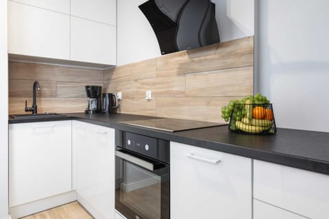 The fully equipped kitchenette includes everything you need for a home-cooked meal.