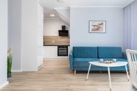 The living room's sleek design is both functional and aesthetically pleasing.