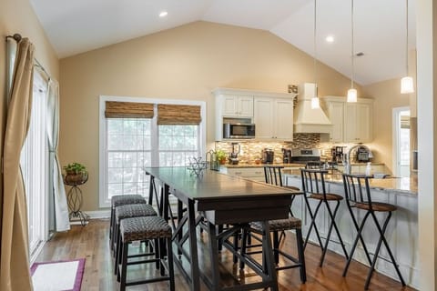 Dining room table slides open for games