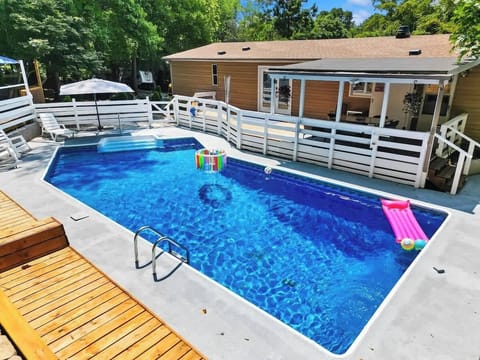 Cool off from the heat of the Charlotte summers in our in ground pool! Just steps outside the back door, enjoy floating in the pool or soaking up the rays in a lounge chair