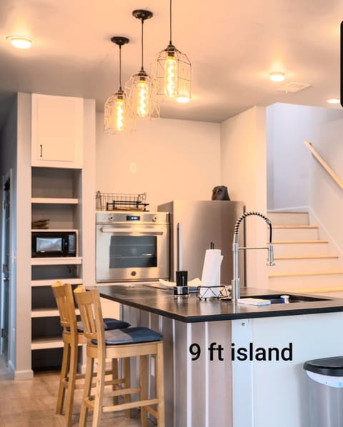 Island and wall oven and small pantry