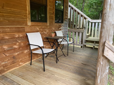 Porch and stairs to the upstairs bedroom and half bath.