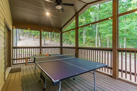 Play a round of ping pong in the enclosed patio (keeps the bugs out)