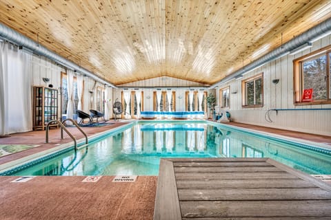 Indoor heated salt water pool year round, doors open to outside in summer
