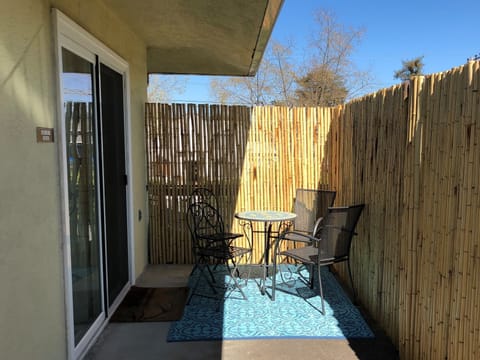 Patio area with table and 4 patio chairs