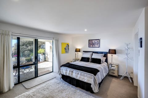 Very spacious bedroom opening onto expansive north facing deck and views