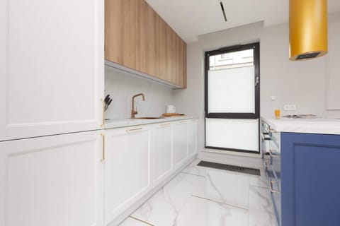 The kitchen has cabinets which are equipped with the necessary dishes that will increase the comfort during your stay.