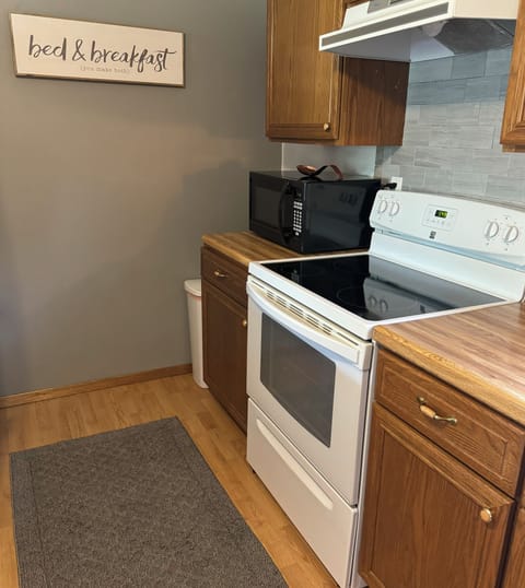 There is a microwave and stove you can use to cook or use the grills outside.