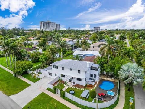 Tropical oasis with pool, hot tub BBQ, bar, games and  dining under lights 