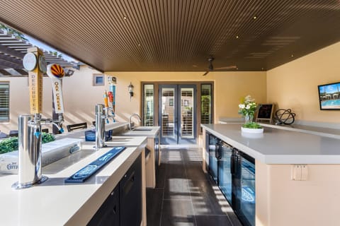 The outdoor kitchen has under counter refrigeration for all of your favorite beverages