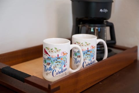 There are coffee machines and a bag of local coffee in each of the guest rooms