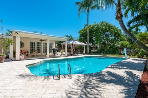 Play in the Impressive large pool for hours of enjoyment for the whole family. The pool deck has covered lounging and dining areas, a BBQ, a new hot tub, a basketball hoop, and games.