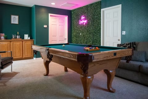 Gorgeous game lounge equipped with pool table and ping pong table