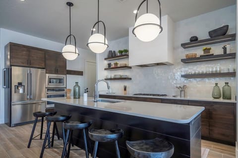 Open concept kitchen with large island that seats 5