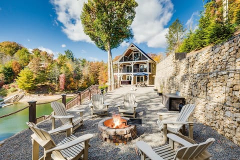 Skipping Stones Getaway Backyard with hot tub, fire pit, wood, roasting forks, corn hole boards, picnic table