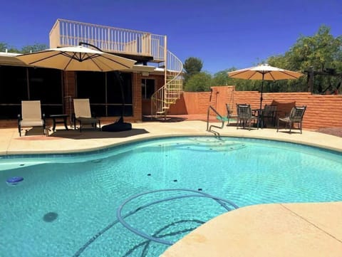 Backyard pool area with plenty of shade