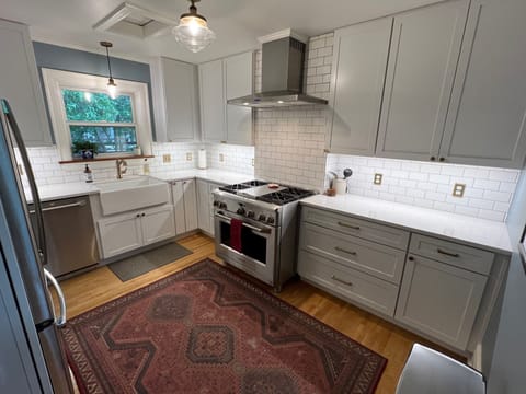 Newly remodeled kitchen with new appliances and everything needed to cook meals.