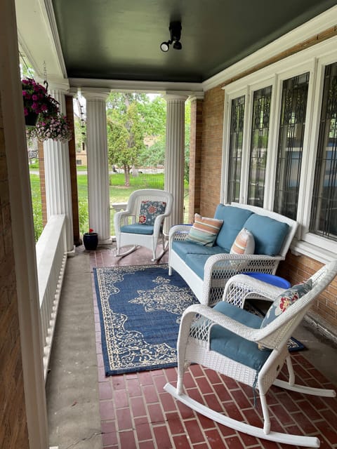 Cozy front porch for enjoying warm evenings.