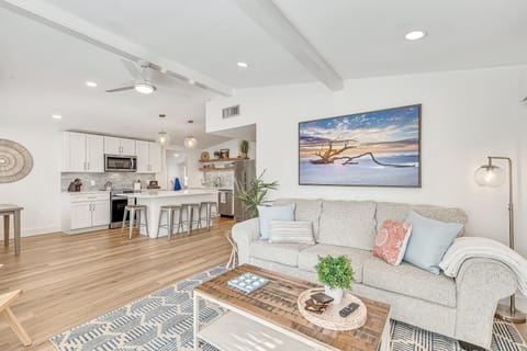 Open floor plan with airy coastal decor so the inside matches the outside.