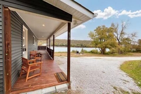 The wrap-around covered porch has 270 river views! Your group can spread out even in bad weather!