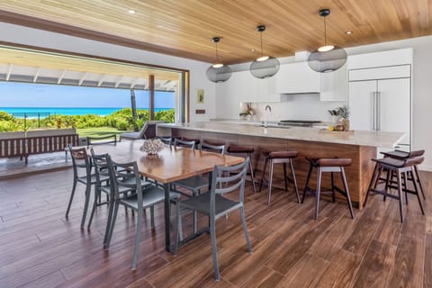 Breakfast bar seating in the open, modern kitchen.