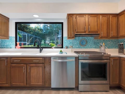 Huge picture window allows views to backyard