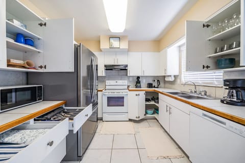 Stocked kitchen. Dishwasher . Stainless steel fridge