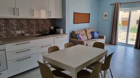 Air-conditioned, well-lit and equipped brand new kitchen, dining and living room