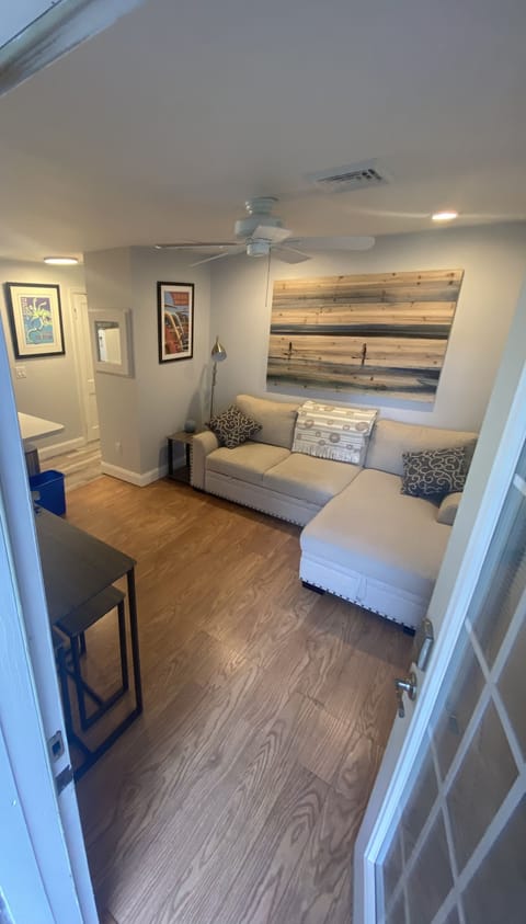 Living Room with Queen pull out sofa and dining area.