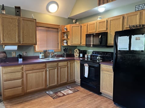 Spacious fully stocked kitchen! 