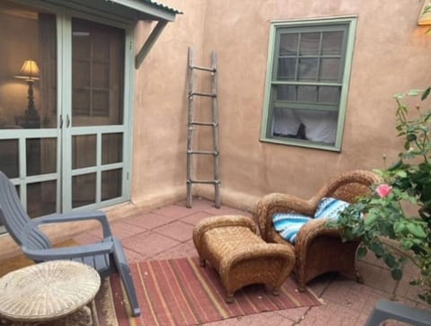 Private, gated courtyard off living room, French door access.