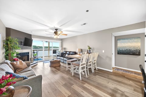 Large open living room with beautiful main channel view of the lake