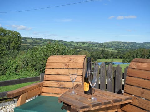 Relaxing sitting out area | Dairy Cottage - Carmarthen Cottages, Cwmdu, Near Llandeilo