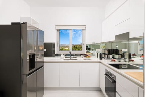 Fully equipped kitchen with branded quality appliances.