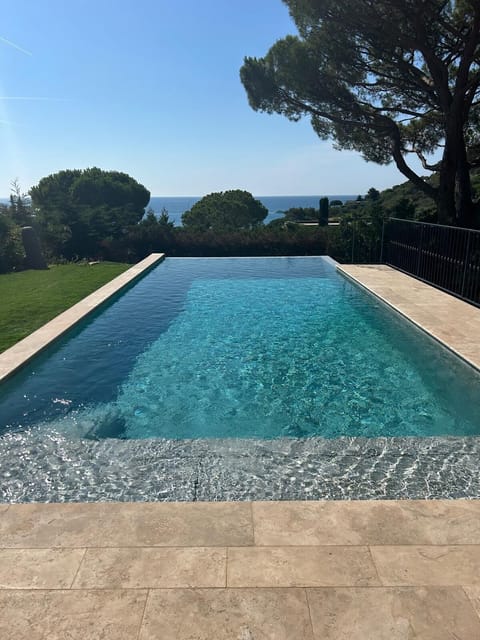 Heated swimming pool with six (6) sunbeds