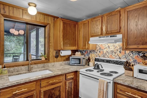 The kitchen is nicely appointed, providing everything you need to prepare a home-made meal