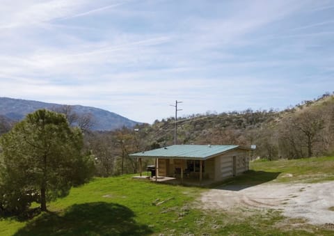 A far away look at the outside of the cabin. 