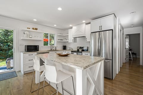 Kitchen with island eating for 2