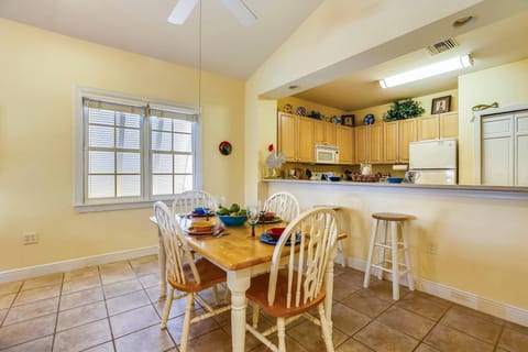 Indoor dining area and breakfast bar in the kitchen.