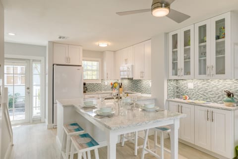 Bright kitchen with seating for four.