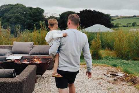 Magnolia Dog has its own outdoor seating area with BBQ/firepit