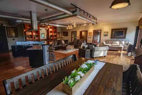 Open main floor: dining area, kitchen, living/family room