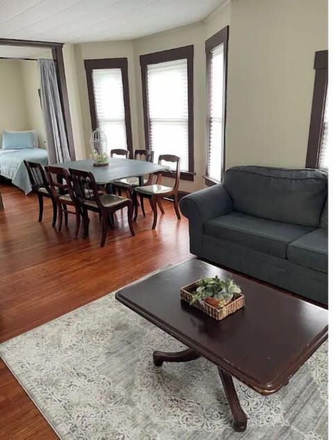 Living room, dining area, and second bedroom.